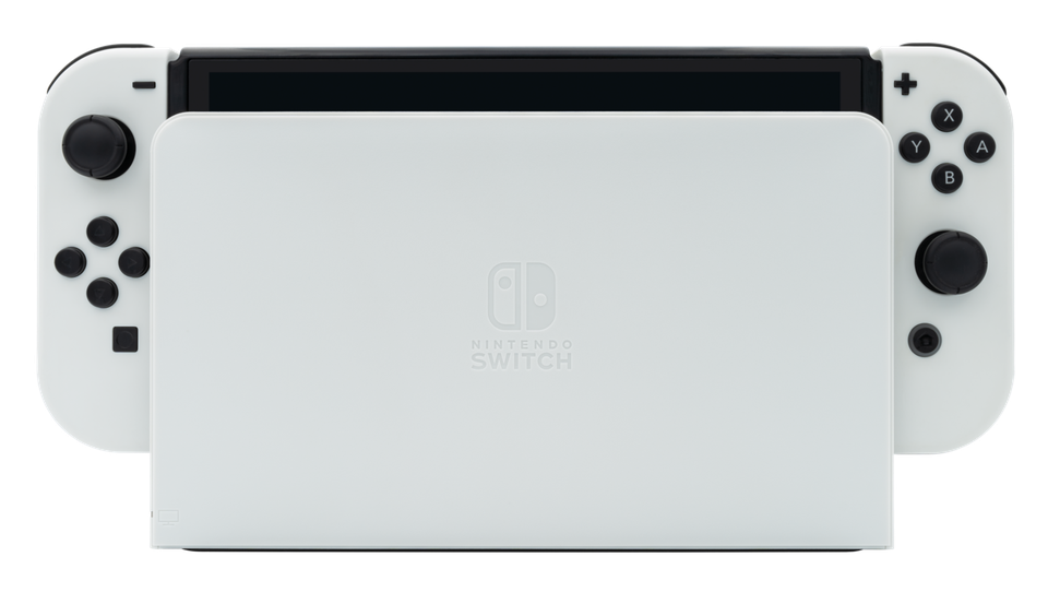 a white nintendo switch oled model docked in its white dock