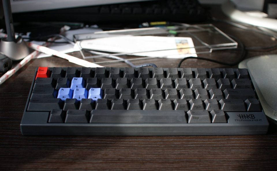 An HHKB Professional Hybrid Type-S keyboard, sixty keys on a two-tone chassis