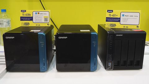 Two QNAP four-bay NAS enclosures photographed at Computex 2019, the same product family as the TS-464