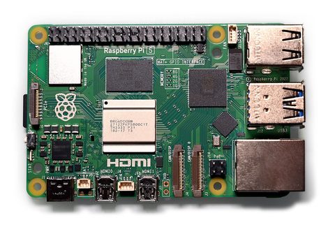 A Raspberry Pi 5 single-board computer showing the chipset, RAM chip, and GPIO header
