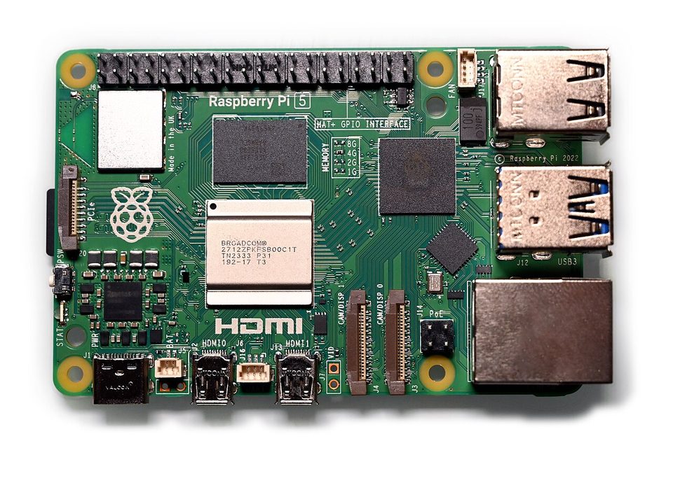 A Raspberry Pi 5 single-board computer showing the chipset, RAM chip, and GPIO header