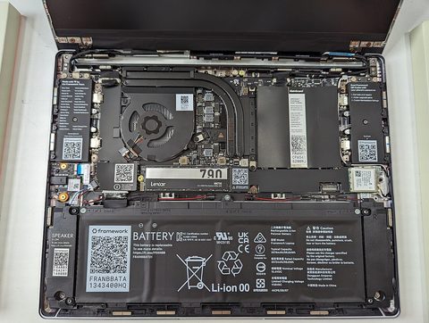 The internal motherboard and components of a Framework Laptop 13 with the bottom panel removed
