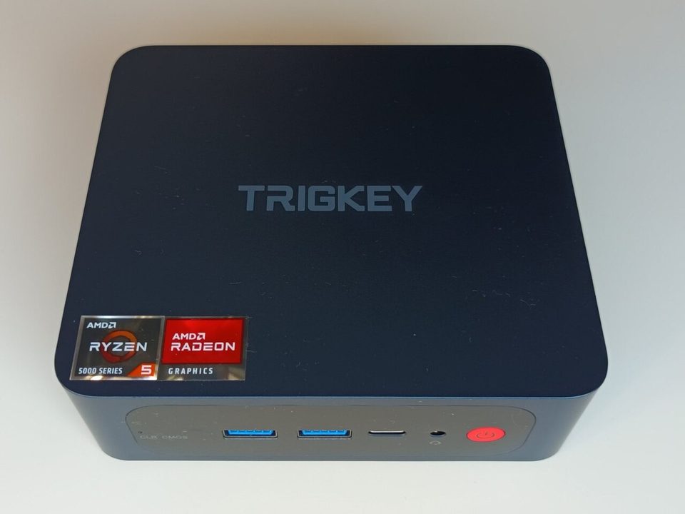 A small mini PC the size of a paperback book, seen from above