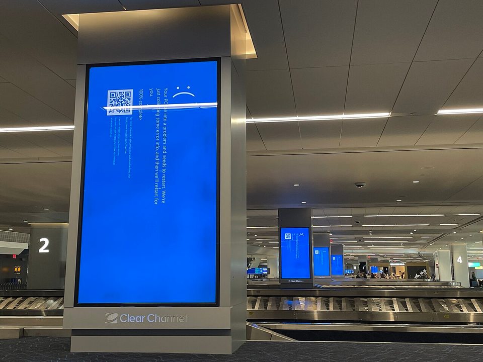 Blue screens of death on check-in screens at LaGuardia Airport, July 19, 2024, during the CrowdStrike outage