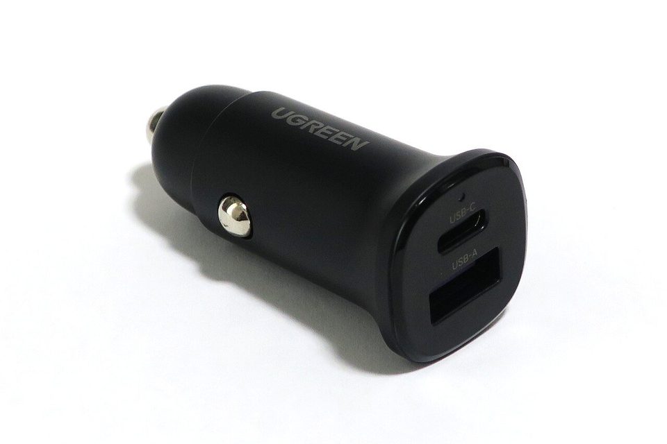 A black UGREEN dual-port USB car charger on a white background, the kind of gear the company was known for before it made a NAS