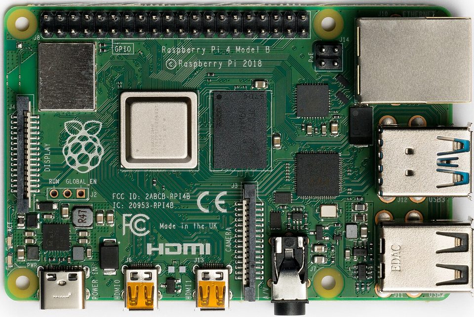The top of a Raspberry Pi 4 Model B single-board computer, the hardware inside Yodeck's player box